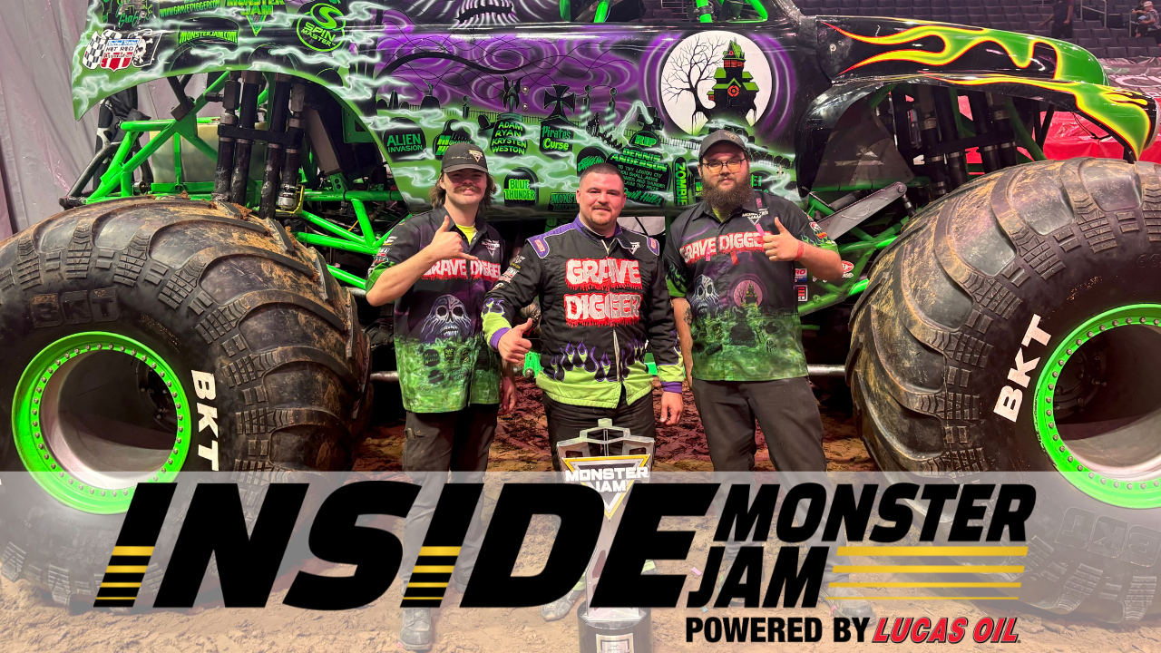 Matt Cody and crew in front of Grave Digger celebrating their championship with Inside Monster Jam logo